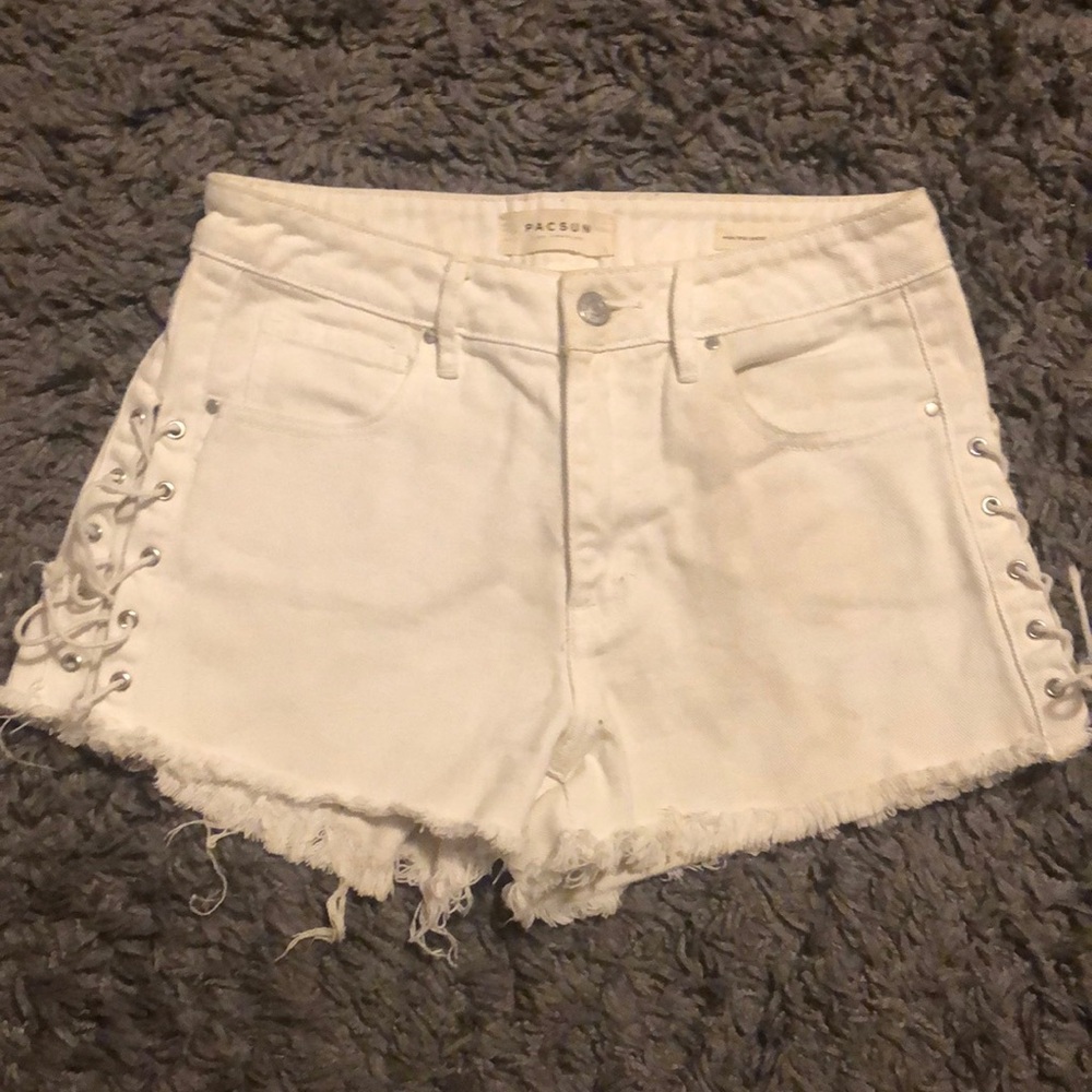 White High Rise PACSUN denim shorts with tied open sides.